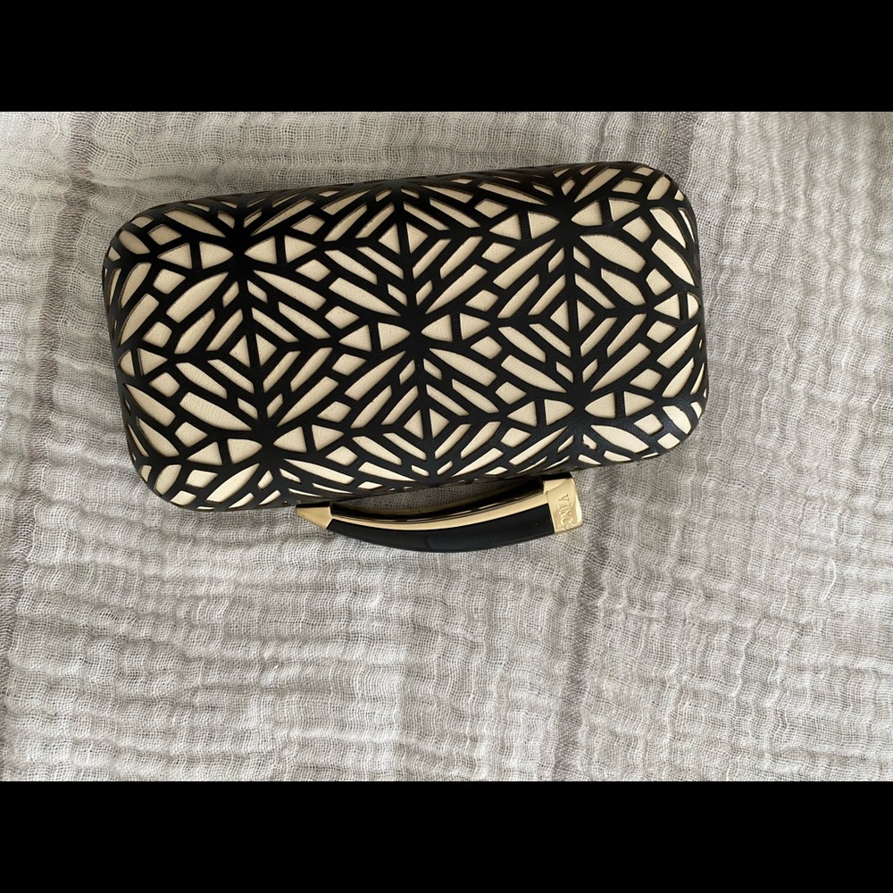 Vince clutch laser cut print. Black & white. NWOT